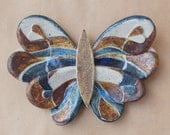 Blue and brown  butterfly ,hanging on the wall sculpture