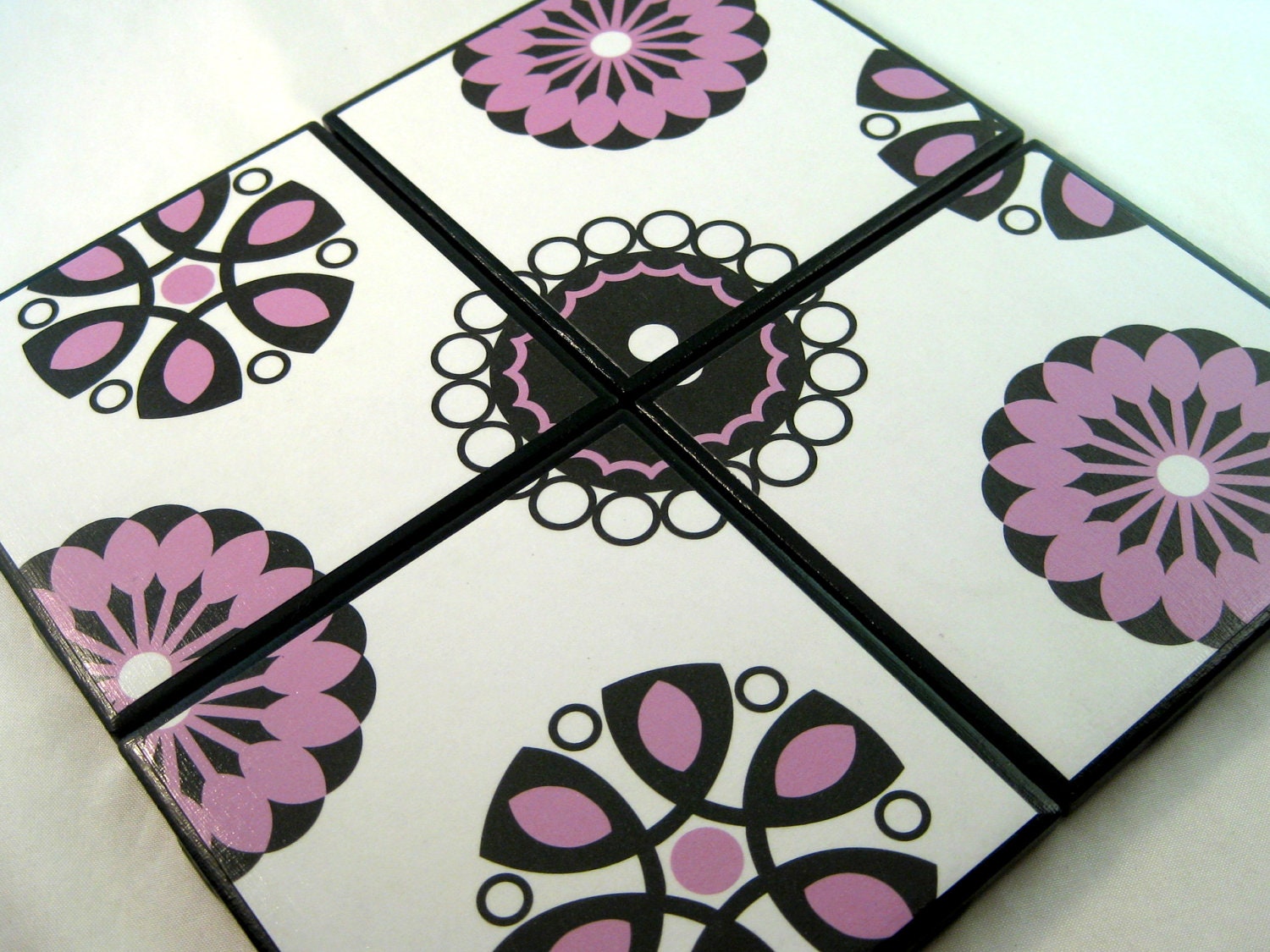 Black Ceramic Coasters with Purple, Black, and White Funky Flower Design
