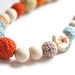 Colors of the autumn statement necklace. Nursing crochet necklace with natural stone, ready to ship. Pastel blue, orange, beige, vanilla