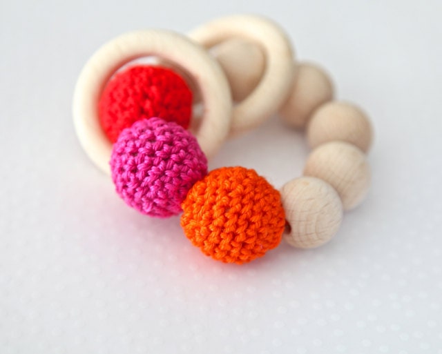 Teething toy with crochet red, pink and orange wooden beads and 2 wooden rings. Wooden rattle. Gift for baby girl.