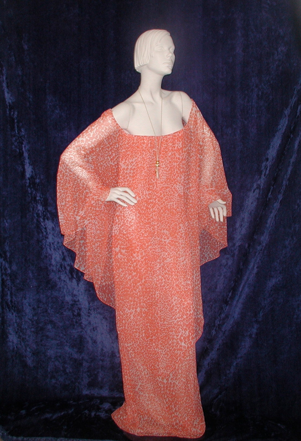 Vtg 70s Albert Caprano chiffon goddess dress in orange animal print---a dozen ways to elegantly drape it
