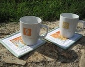 Coasters Mug rugs, set of 2 with patchwork in orange, green, white