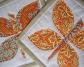 Coasters Mug rugs, set of 2 with Butterfly applique in orange, white, beige