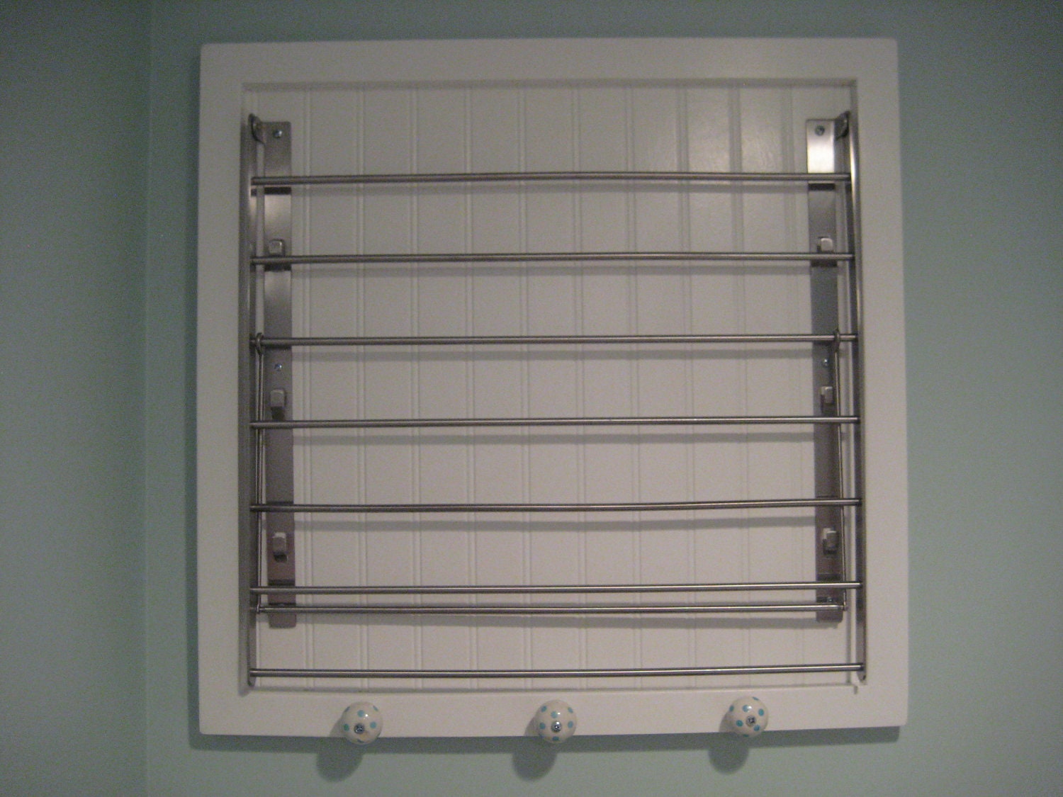 Centsational Girl » Blog Archive » DIY: Laundry Room Drying Rack title=