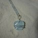 Wire wrapped pale blue sea glass necklace