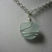 Wire wrapped pale blue sea glass necklace