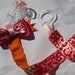 pink and orange animal print pacifier clip- binky holder- baby needs