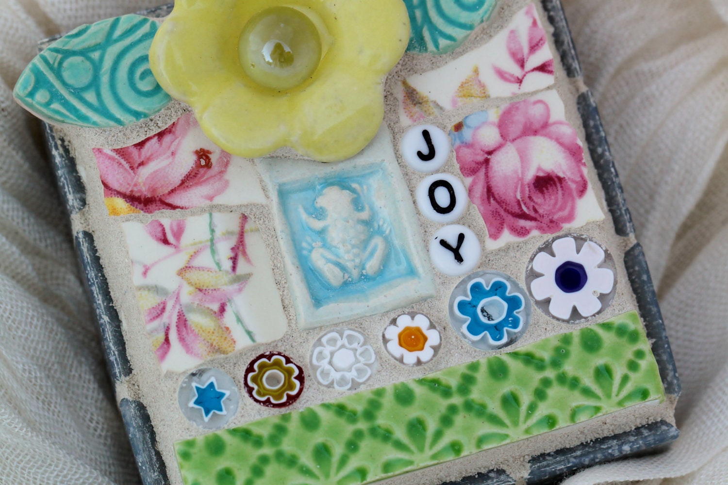 Joy, with frog and flower, mosaic art