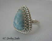 Natural blue larimar sterling silver metalsmithed ring
