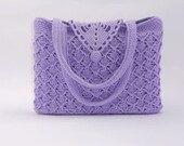 Crochet pattern of a handmade beautiful handbag with tunisian crochet detail lilac-coloured