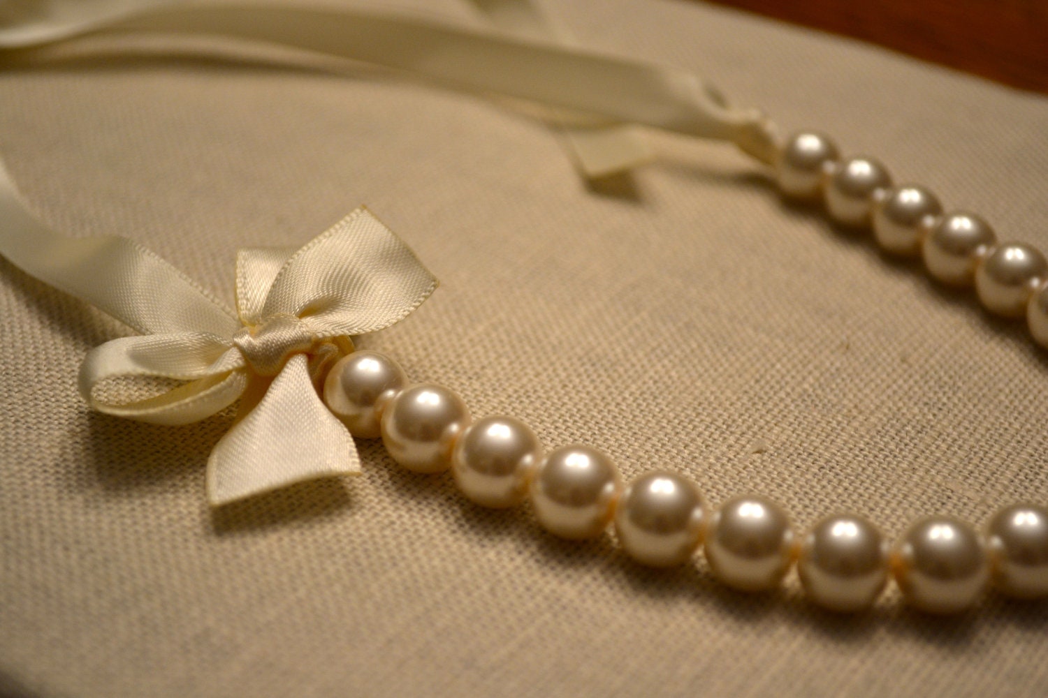 Nora: Beautiful Ivory Pearl Ribbon Necklace with Bow