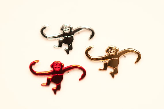 3 laser cut monkey brooches