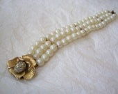 Three Strand Pearl Bracelet with Rhinestone Flower