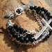 MIDNIGHT...Black crystal Multi-strand Rhinestone Sideways Cross Bracelet