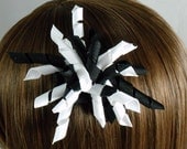 Black and white korker pom pom hair bow