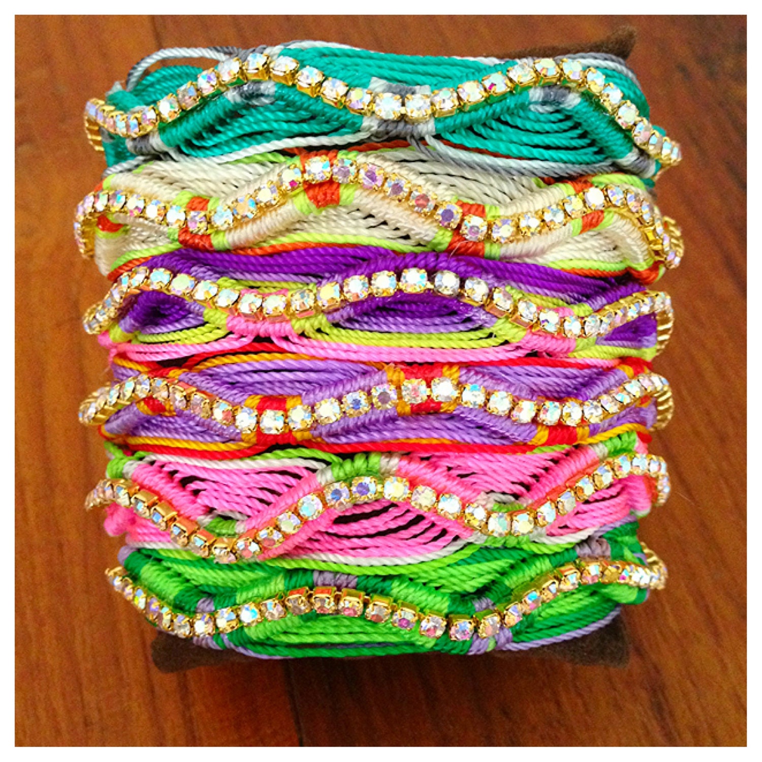 Neon, handwoven diamante friendship bracelets embellished with aurora borealis crystal chain.