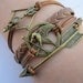 Bracelet-THE HUNGER GAMES bracelet,bird bracelet,bow and arrow bracelet-Z513