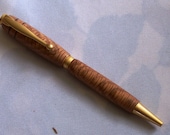 Twist Ball Point Pen in Satin Gold with Cross Grained Red Oak.