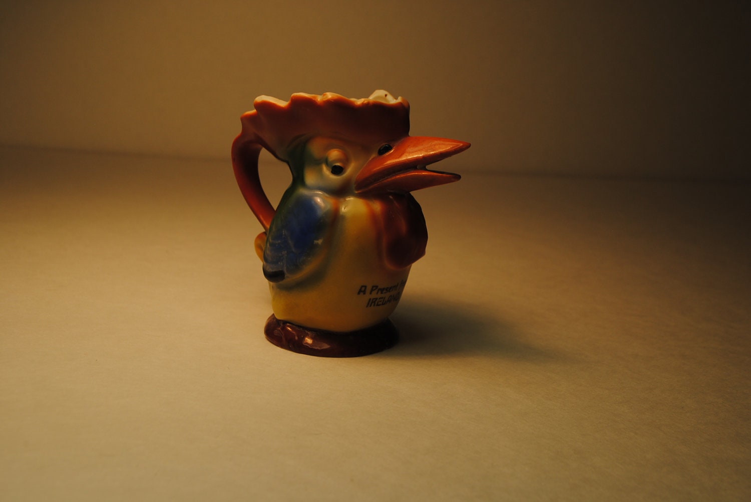 antique 1930s IRISH creamer TOUCAN which is associated with Guinness beer a lovley and rare find blue orange yellow