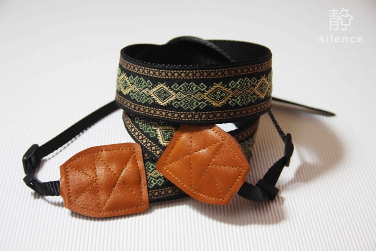 camera strap for DSLR with black and green bonehead neck strap