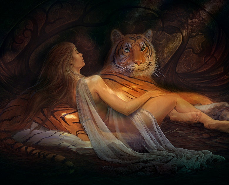 Kindred Spirits. Woman and her pet tiger relax.
