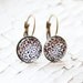 Rebecca Black and White Leopard Dangle Earrings