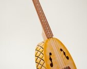 Pineapple ukulele  (relief carved sides and back)