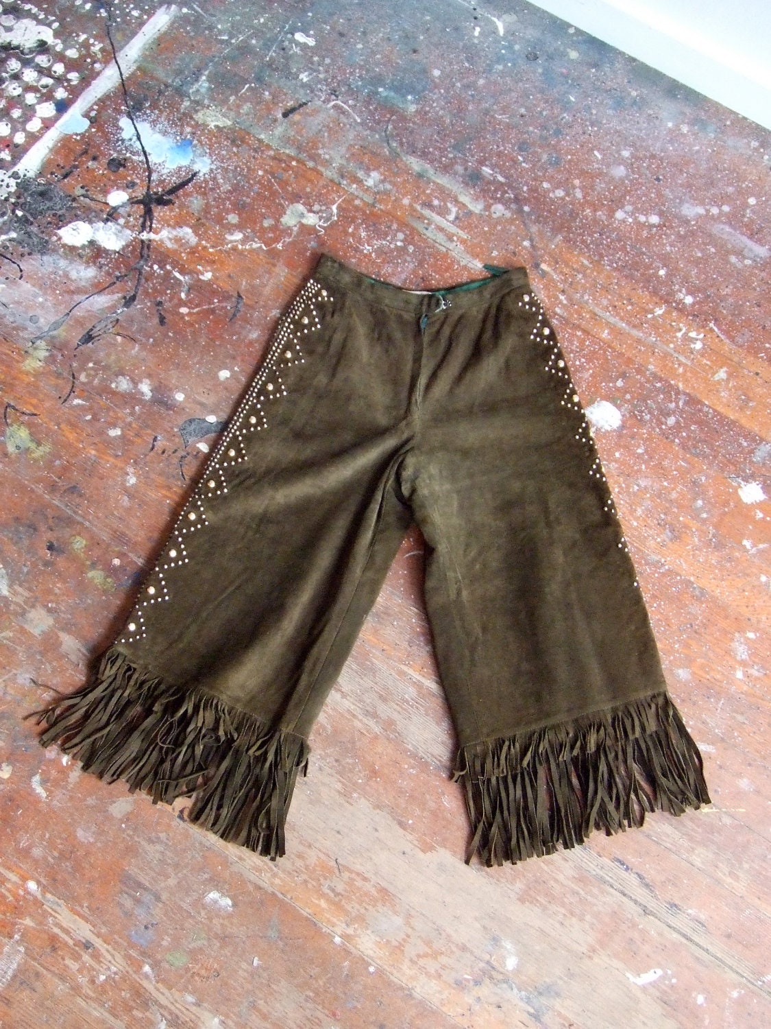 SALE////Vintage 1970s designer green suede culottes with fringe and studded details