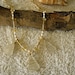 Sea glass necklace. Wire wrapped gold beach glass necklace. Sea glass jewelry.