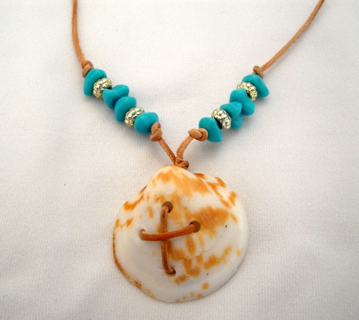 Real shell cross with turquoise and silver beads