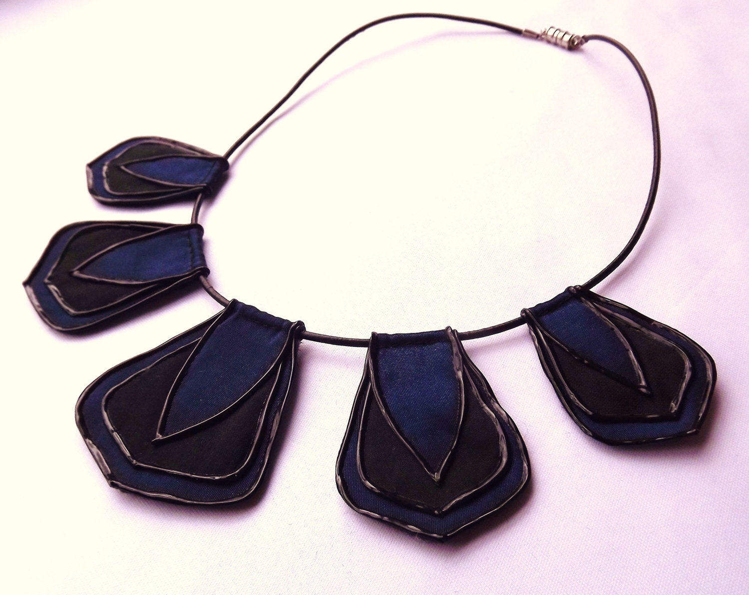 Striking tribal collar necklace by begurple in black and navy blue
