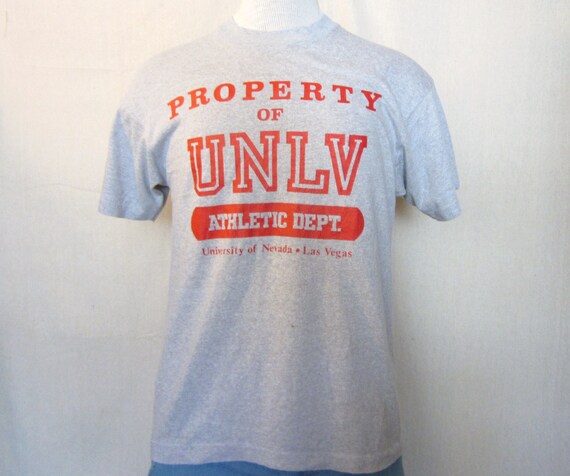 Buy college sports apparel - Vintage Amazing 80s PROPERTY UNLV REBELS Graphic College Sports Athletic Screen Stars Unisex Medium 50/50 T-Shirt