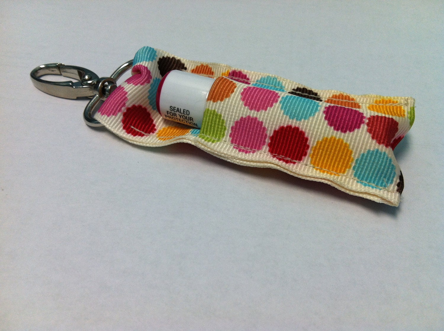 Multi-colored patterned scalloped polka dot Key Fob Chapstick Holder