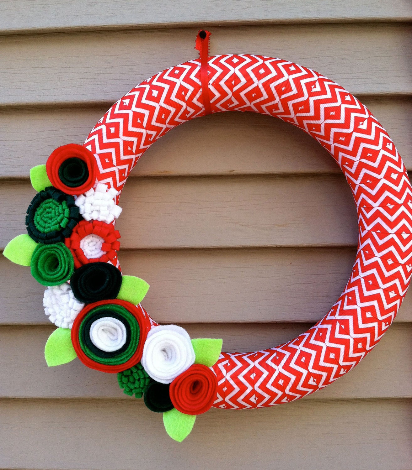 Christmas Wreath wrapped in Chevron Christmas Ribbon decorated with felt flowers. Great for the Holidays. Holiday Wreath. Christmas Wreath