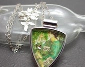 The Daydream. One of a kind collage necklace under resin featuring fine art by Dante Gabriel Rossetti