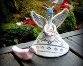 Sweet Fairy Queen holding flower