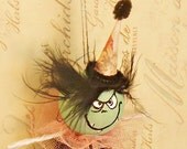 quite unfortunate looking trick or treat monster party doll