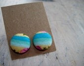 button earrings - shades of turquoise on flax with a hint of purple flower