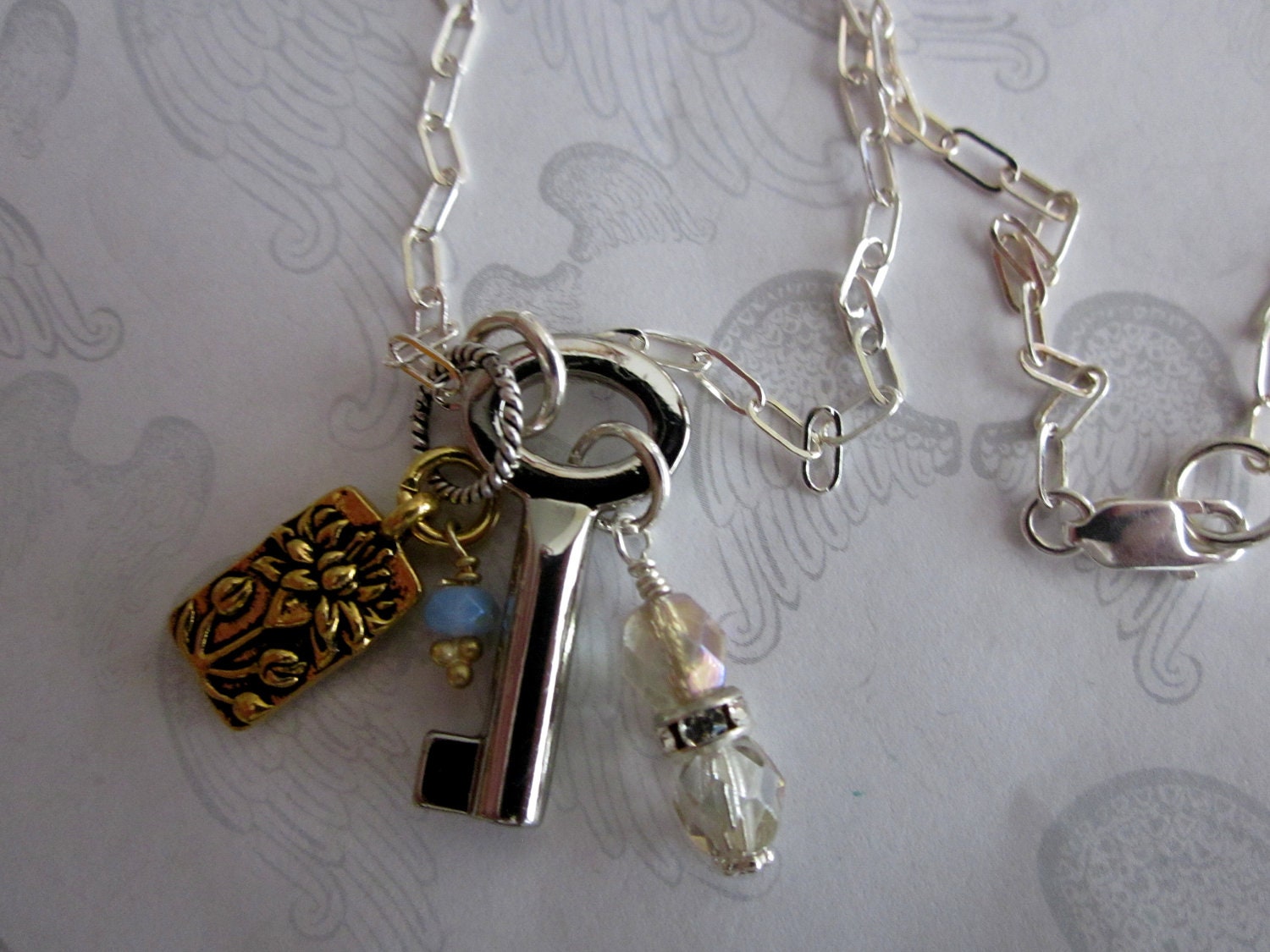 Charm Necklace with Silver key & Gold Flower on Sterling chain