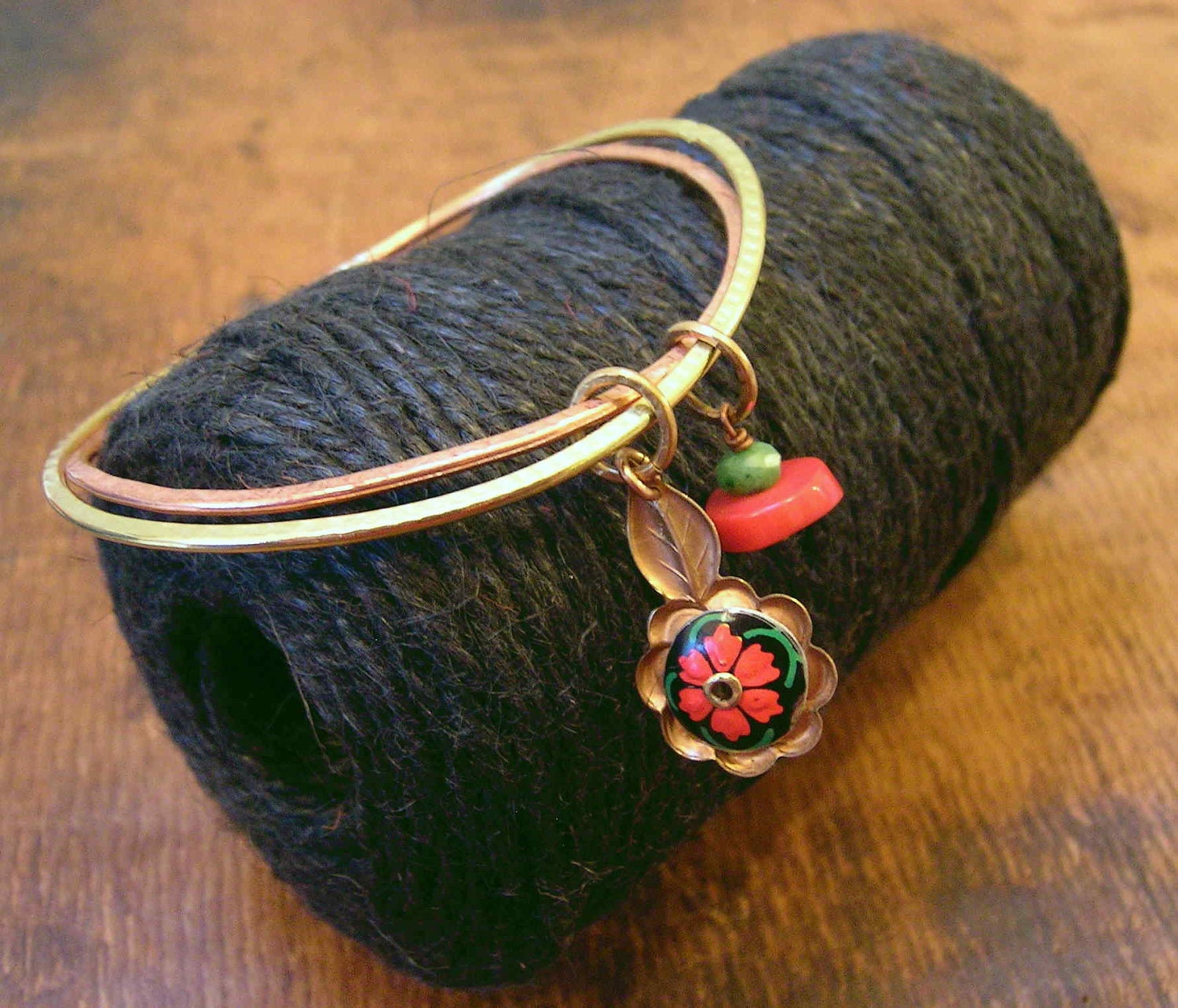 Folk art floral simple double bangle. Red, green, black, copper, brass.