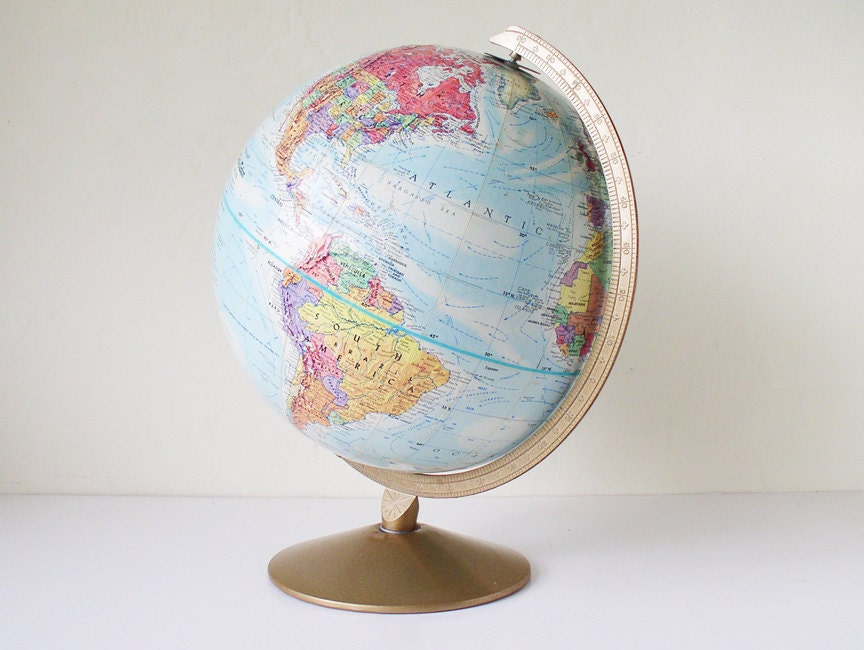 Vintage globe with metal base