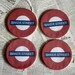 Baker Street Sherlock Holmes Themed Round Metal Coasters - Set of 4