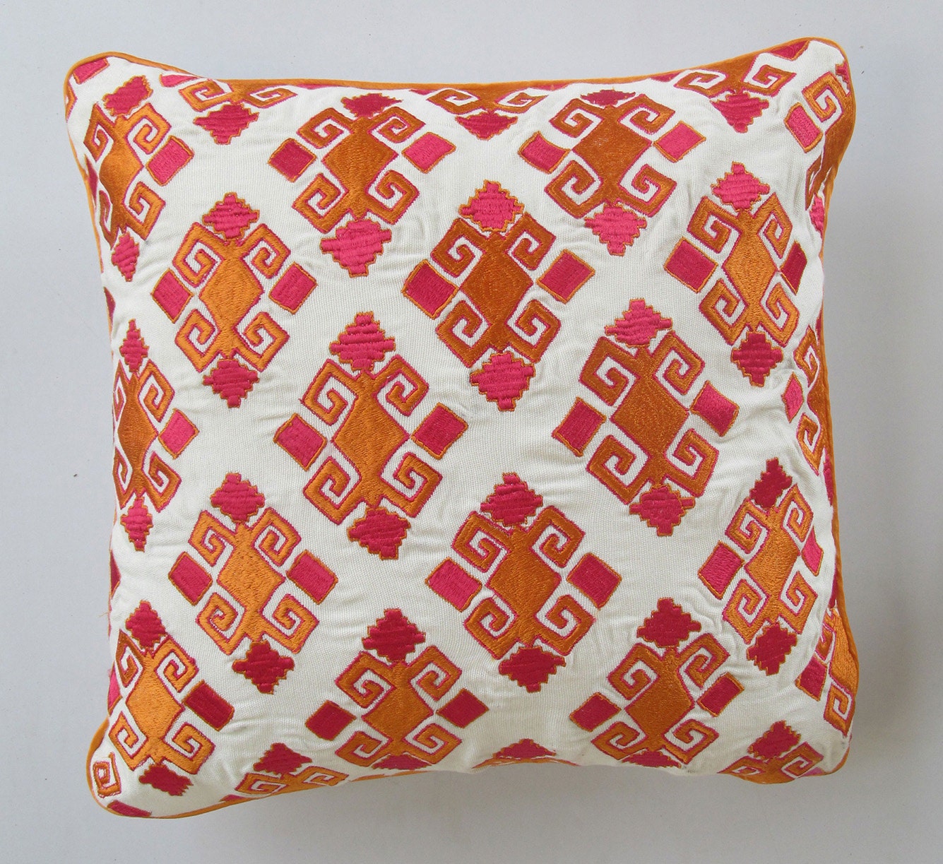 golden orange and fushia pink diamond design on off white throw pillow 18 inch IN STOCK