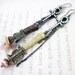 The Three Passions. Rustic gypsy, victorian tribal long earrings with rhinestone ankhs bone lampwork bullet bronze.