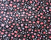 Quilting cotton black ground tiny floral remnant