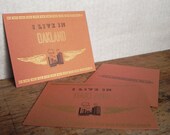 SALE 15% off--Single Letterpress Postcard I Live in Oakland Gold and City Wings