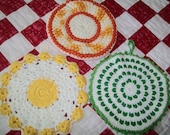 3 vintage potholders, crocheted, 1950s, 1960s, round, pot holder, yellow, green, orange, white, tangerine, trivet