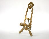 Brass Easel. Plate Stand. Book Holder. Book Stand. Display. Decorative. Gilded Metal. Gold. Golden. Metallic. Aged Patina. Traditional.