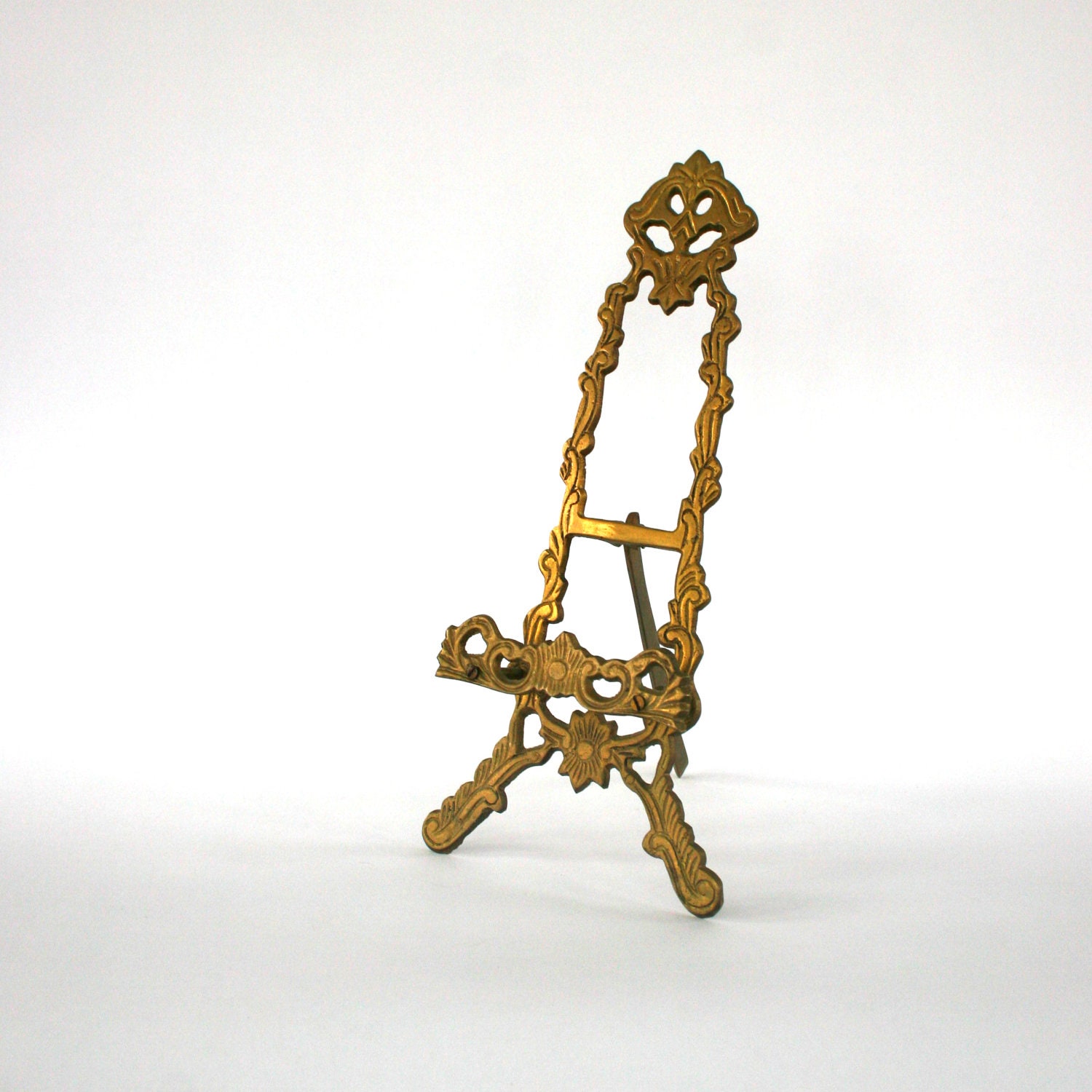 Brass Easel. Plate Stand. Book Holder. Book Stand. Display. Decorative. Gilded Metal. Gold. Golden. Metallic. Aged Patina. Traditional.