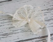 Ivory lace bow tieback